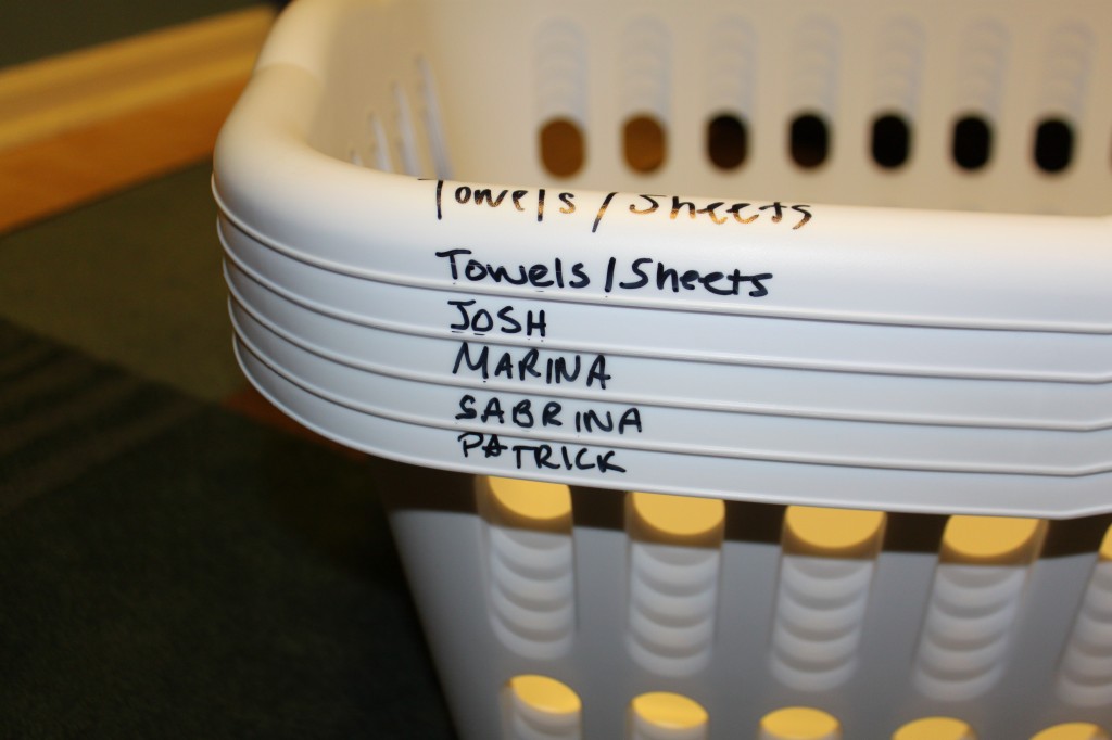 Laundry basket markers for each family member