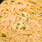 mix the cooked egg peas bacon cheese mixture with spaghetti