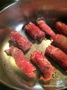 braciole uncooked in pan