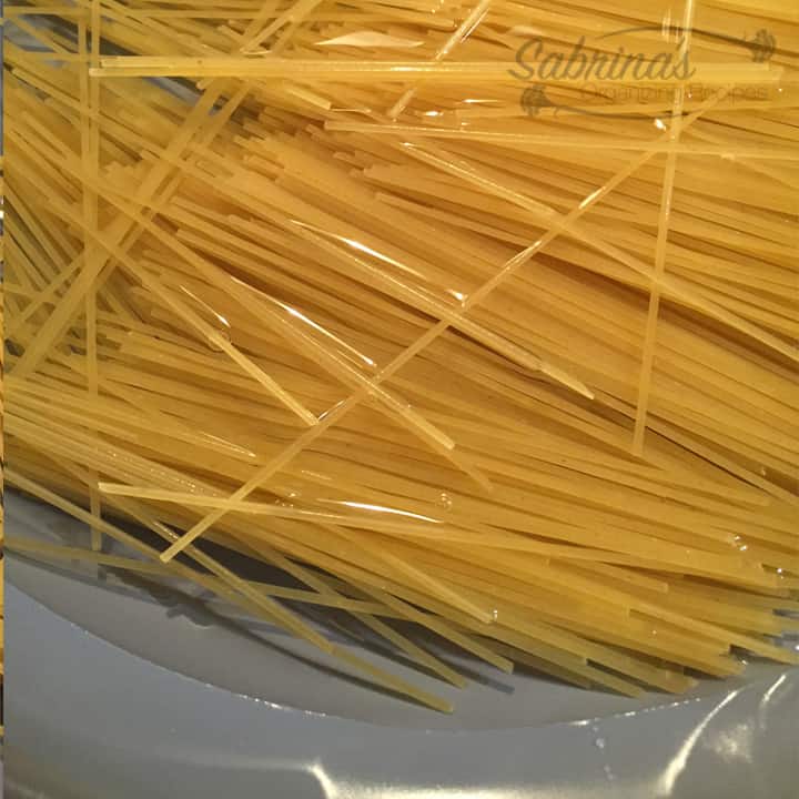 Add water to the hard spaghetti