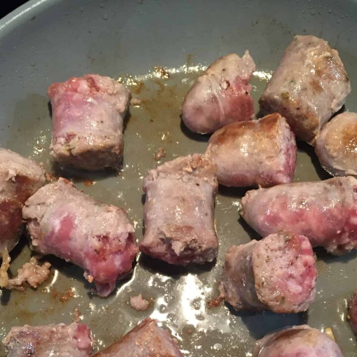 sausage in skillet browning