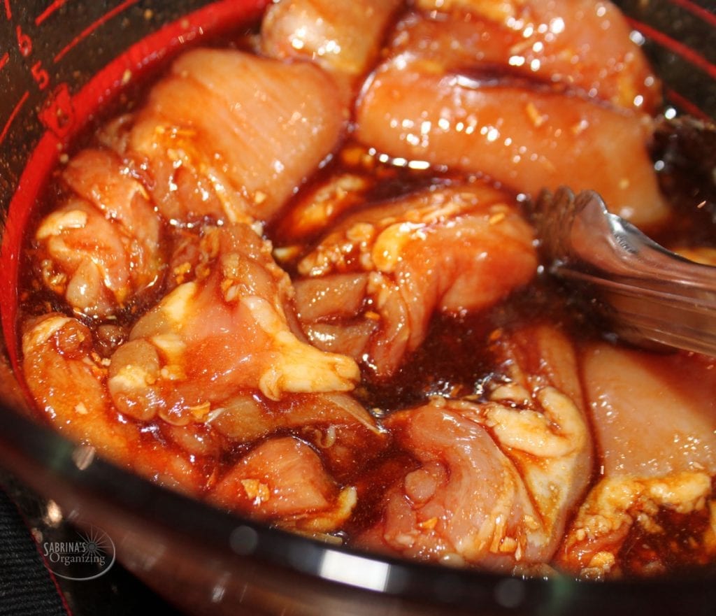 asian chicken thigh recipe marinated in a bowl