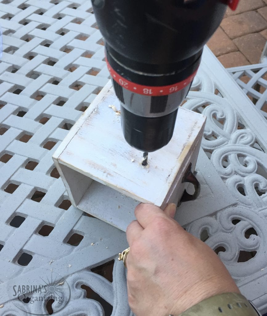 drill the holes into the side of the planters
