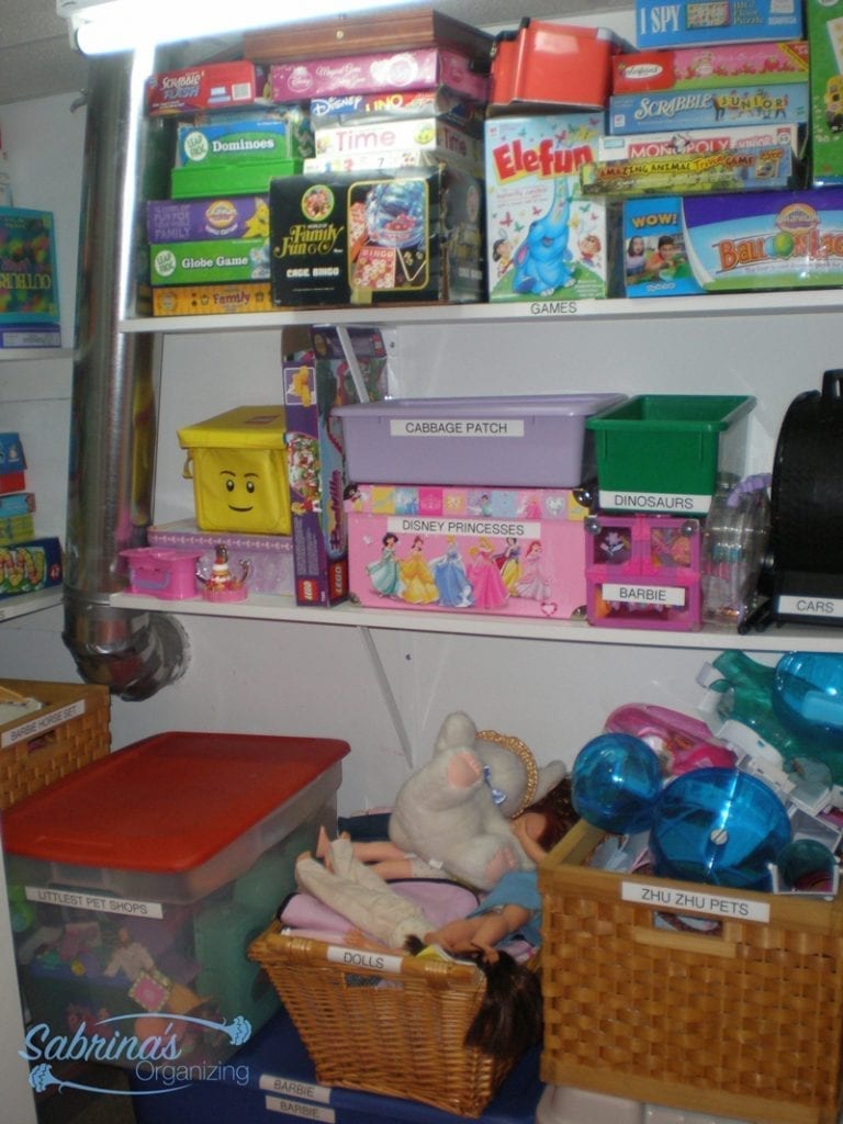 Closet playroom organization by Sabrina's Organizing