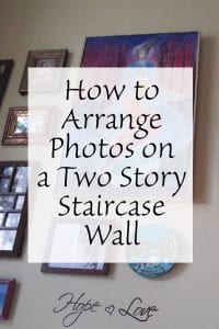 How to Arrange Photos on a Two Story Staircase Wall
