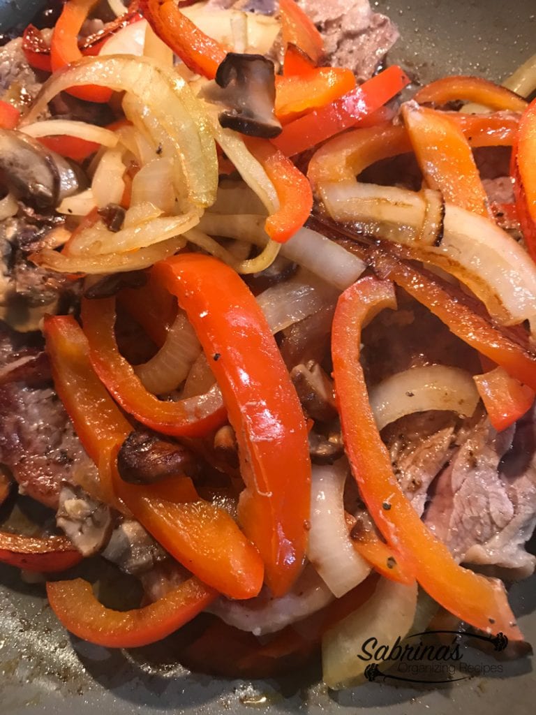 move peppers on top of the meat