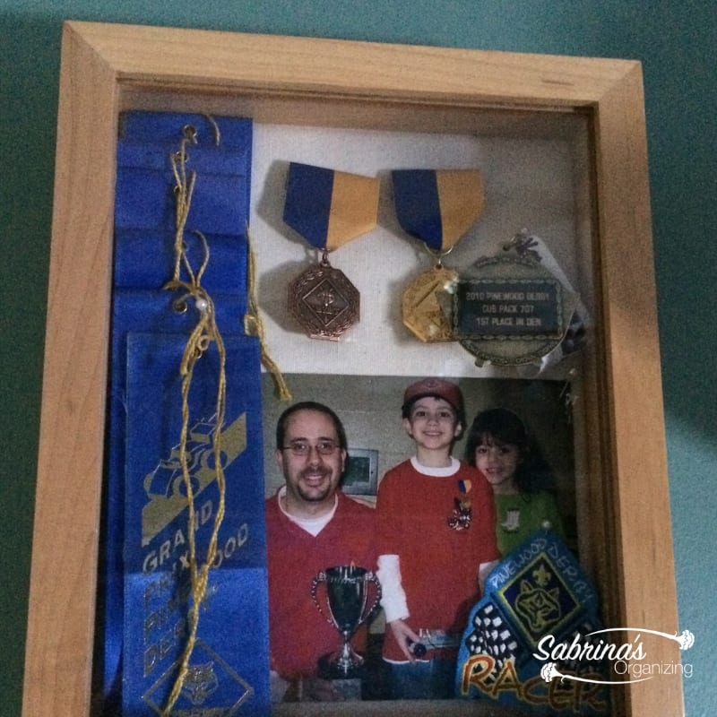 Use shadow boxes with an opening in the front