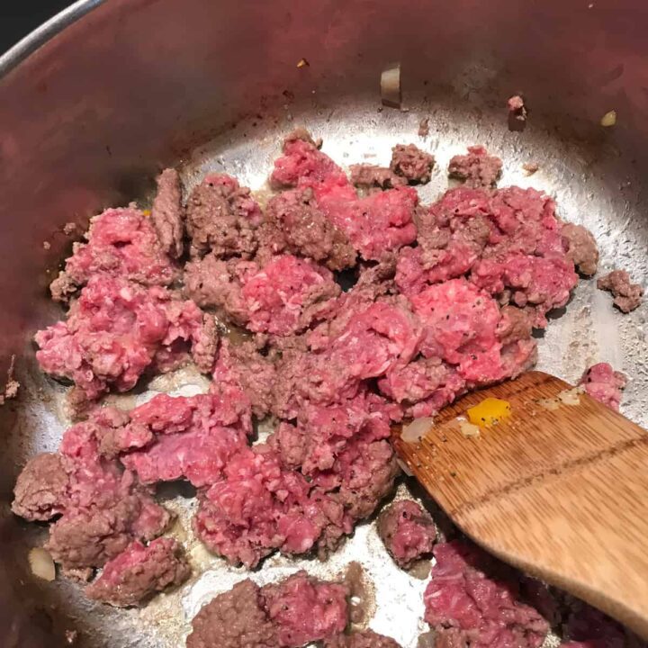brown the ground beef in the fry pan before placing in the slow cooker