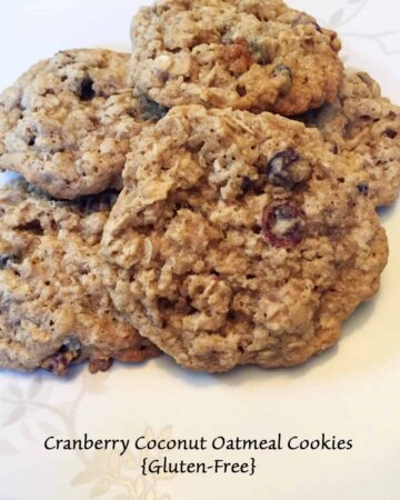 Gluten Free Cranberry Coconut Oatmeal Cookies - cookie on a plate - featured image