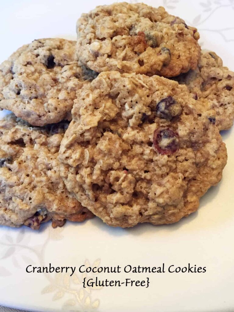 Gluten Free Cranberry Coconut Oatmeal Cookies - cookie on a plate - featured image