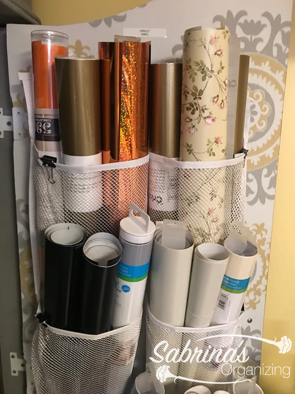 Store Cricut Rolls on the back of the door