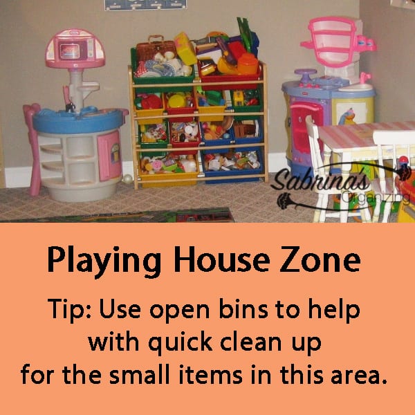 Playing house zone - Use open bins to help with quick clean up for the small items in this area.