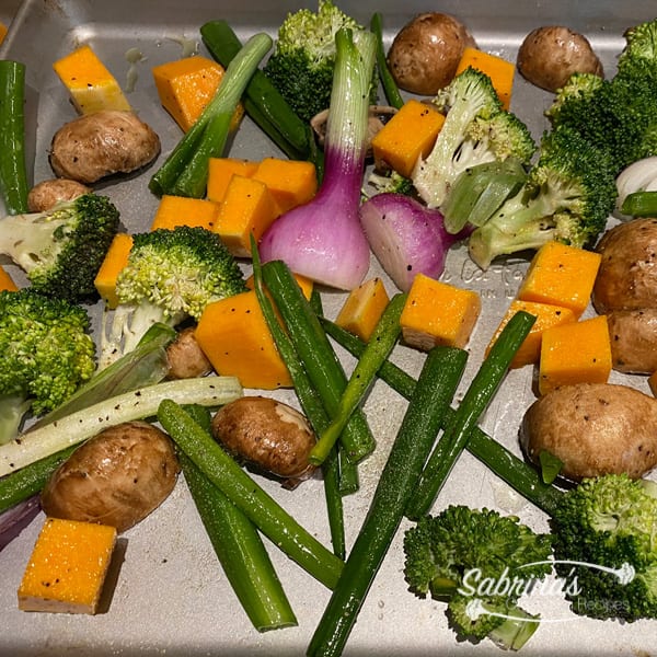 Roasted Seasonal Vegetable with Quinoa Recipe not cooked veggies on baking sheet. 