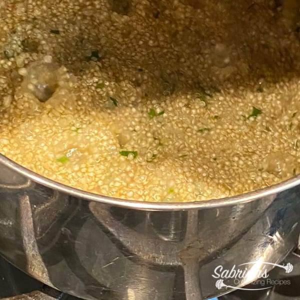 quinoa with parsley, pepper, salt, water to a saucepan