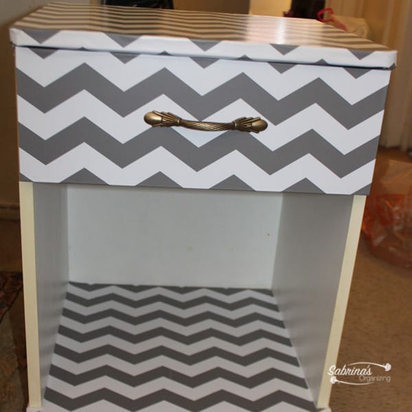 self-adhesive vinyl used to dress up a shabby night stand