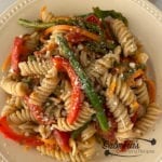 Gluten Free Pasta Primavera Recipe finished dish with romano cheese on a plate