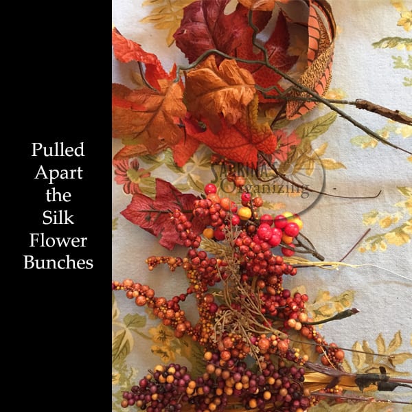 Pull apart the silk flower bunches to make the fall wreath