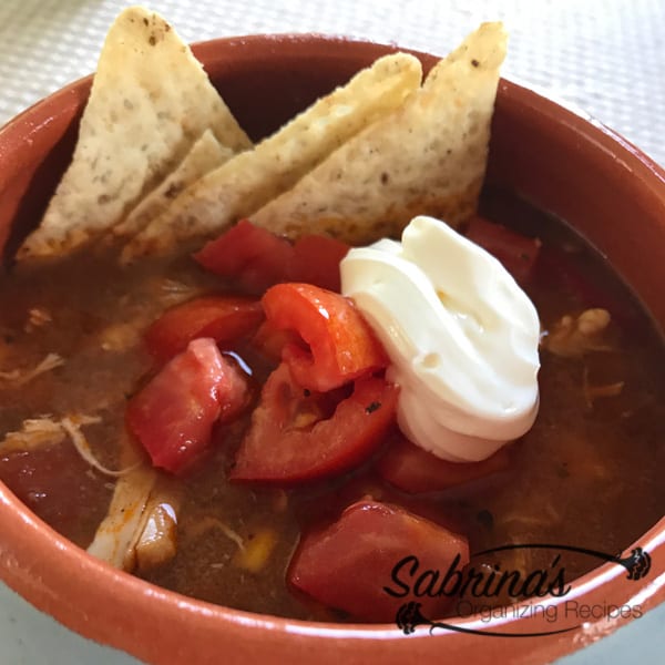CHICKEN TORTILLA SOUP RECIPE IN A SLOW COOKER recipe bowl with soup in it