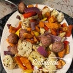 Cooked Pork Sausage Meatballs Yams cauliflower Recipe in a platter