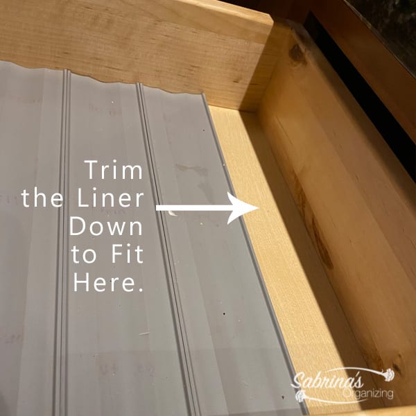 Trim the liner down to fit the last part of the drawer