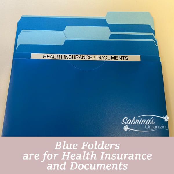 Blue folders are for health insurance and documents