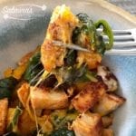 Quick Chicken Breast Recipe with Vegetables in a bowl using a fork