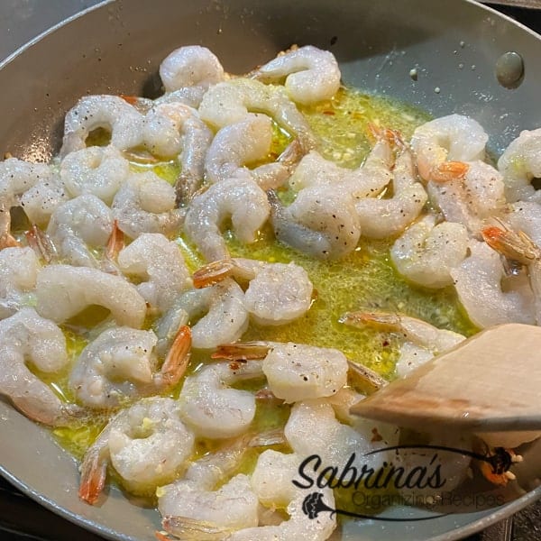 Add shrimp to cook in skillet