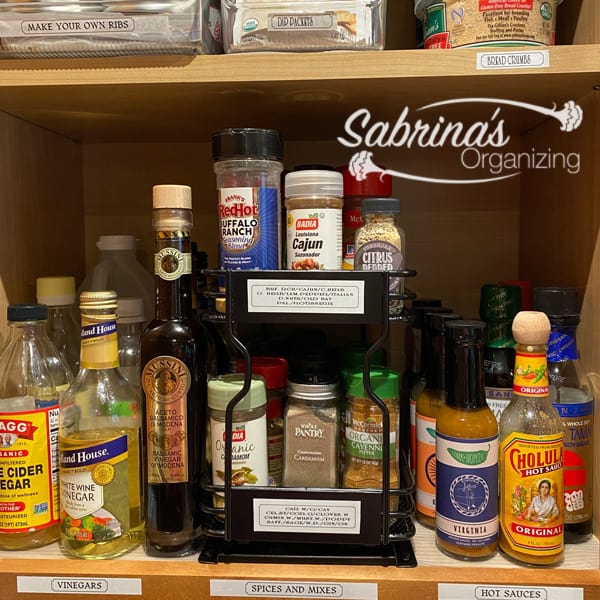 Using a label maker I labeled the areas on the spice rack and shelves