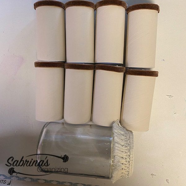 Finished toilet paper rolls and glass jar