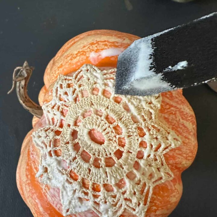 Orange foam pumpkin and foam brush adding mod posh to the pumpkin and adding lace - square image