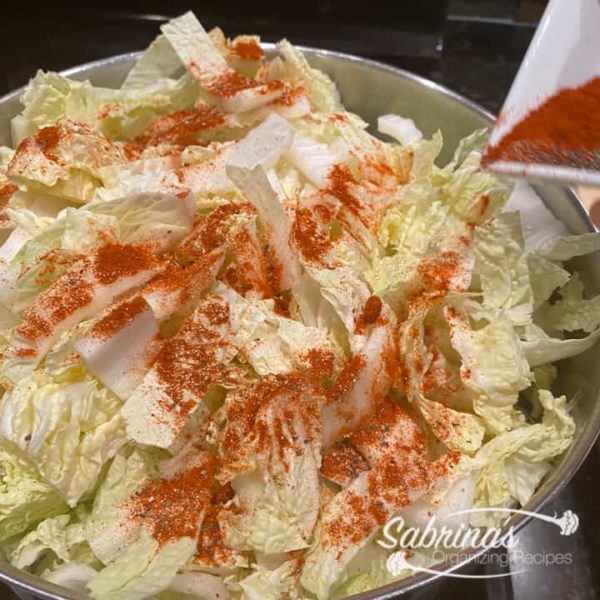 Add cabbage, garlic, paprika pepper to the pan and cook