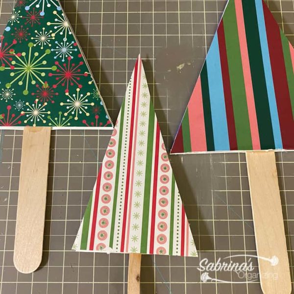 finished cardstock covered triangles with sticks