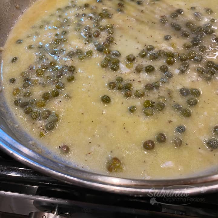 Add capers and lime to skillet