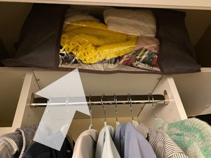 Large storage bin by Lifewit stored on the top shelf of the small closet