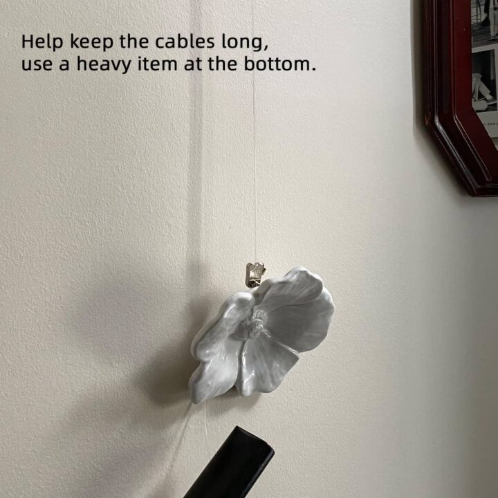 To keep the cable steady add a weight to the bottom