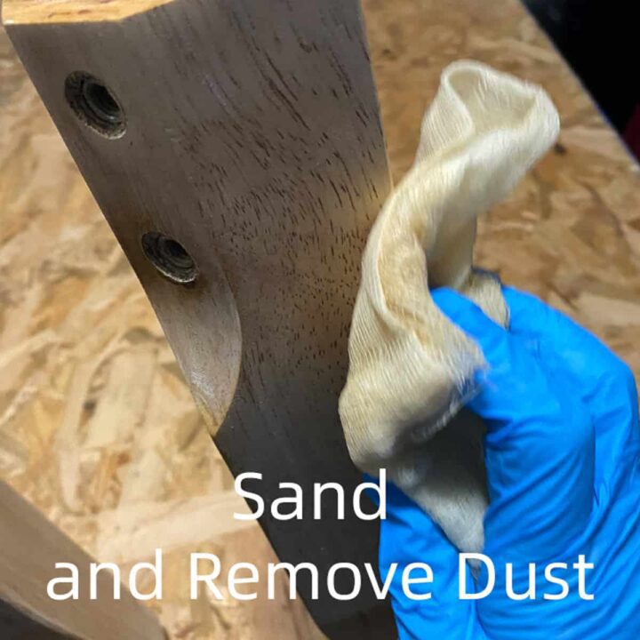Sand and remove dust from pieces