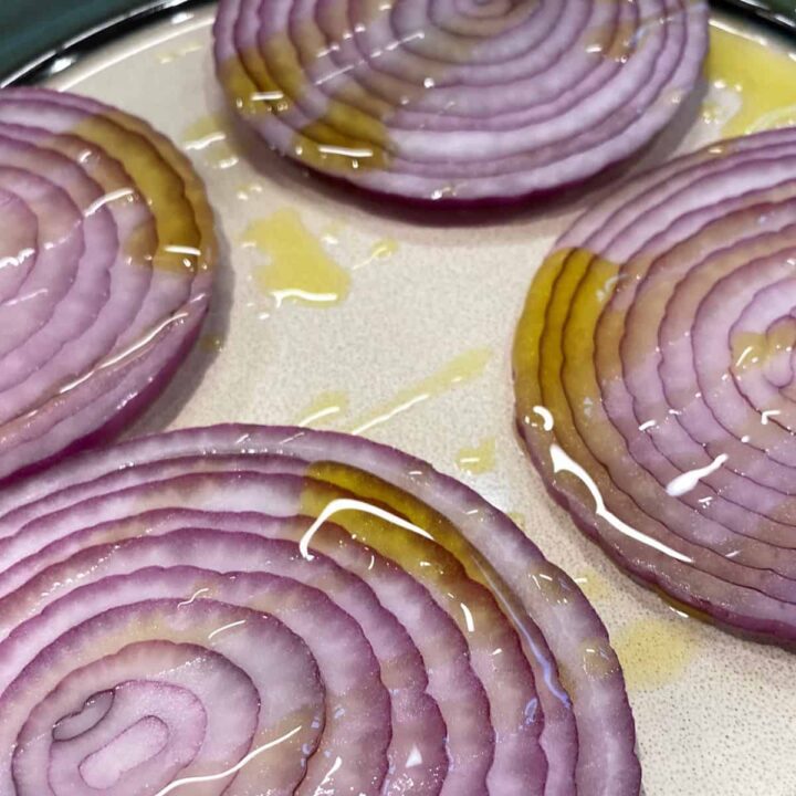 drizzle olive oil on onion and grill square image