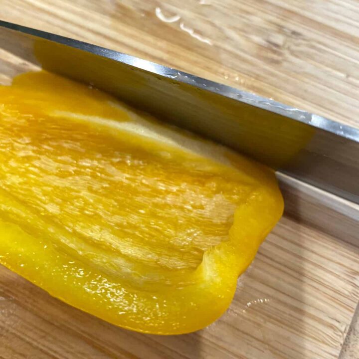 Cut bell peppers into slices then 2 inch wide pieces