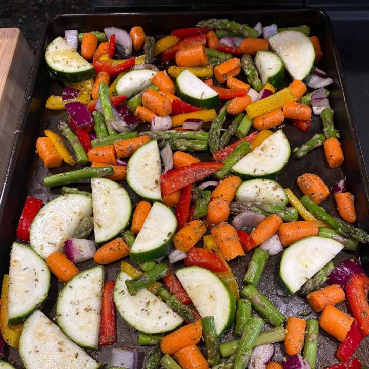 Place the mixed vegetables on two baking sheets