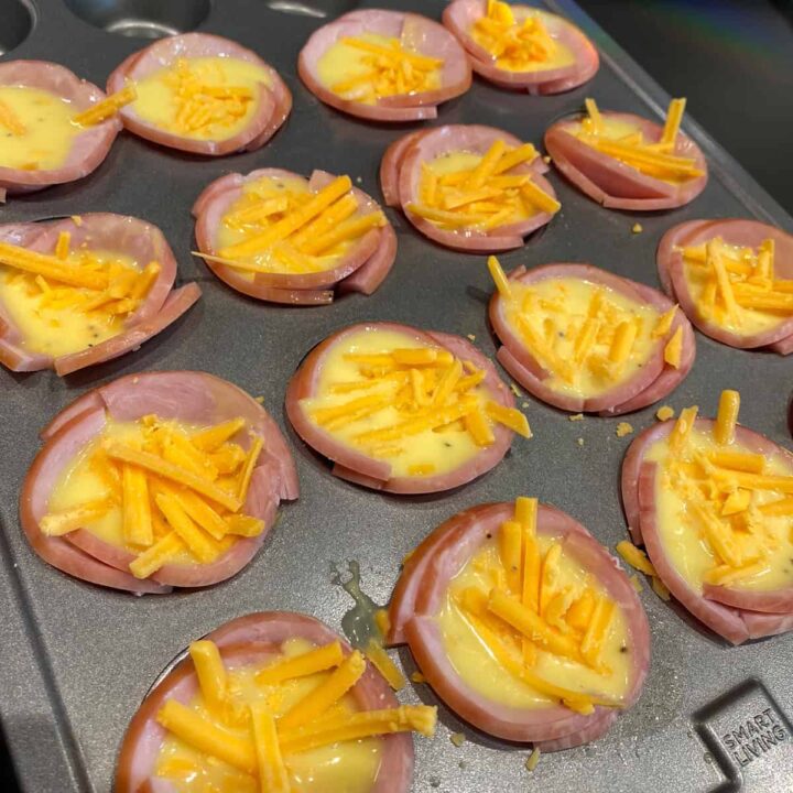Add the egg to the Canadian Bacon cups