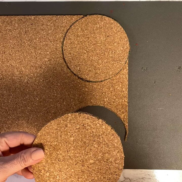 Cut cork into circles to match the wood