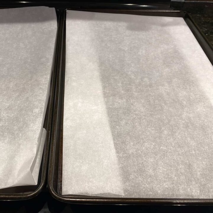 Cover baking sheets with parchment paper