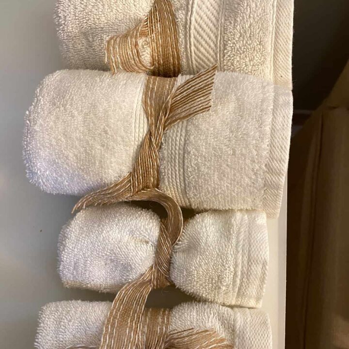 Rolled up towels tie ribbon