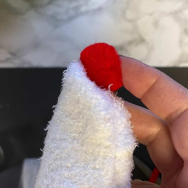 Add cotton ball to the top of the sock