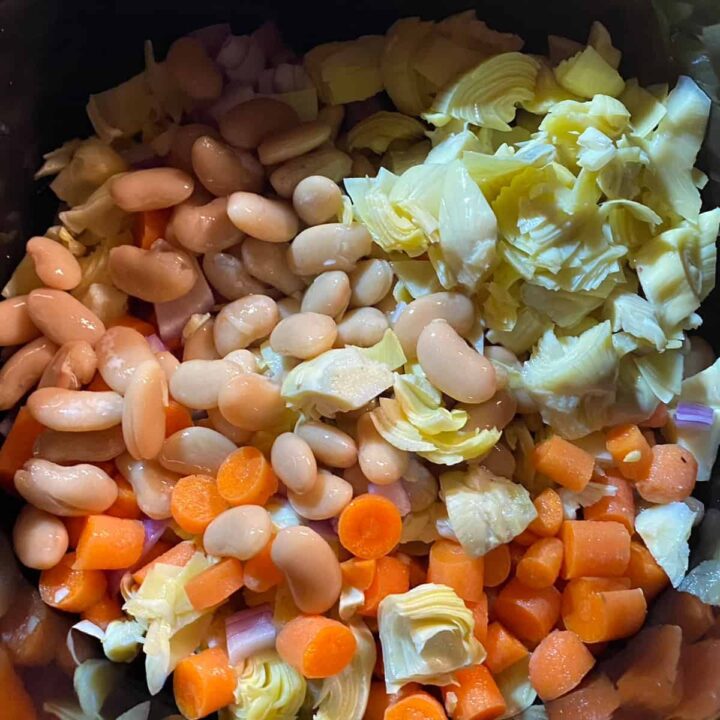 add beans and artichokes to slow cooker