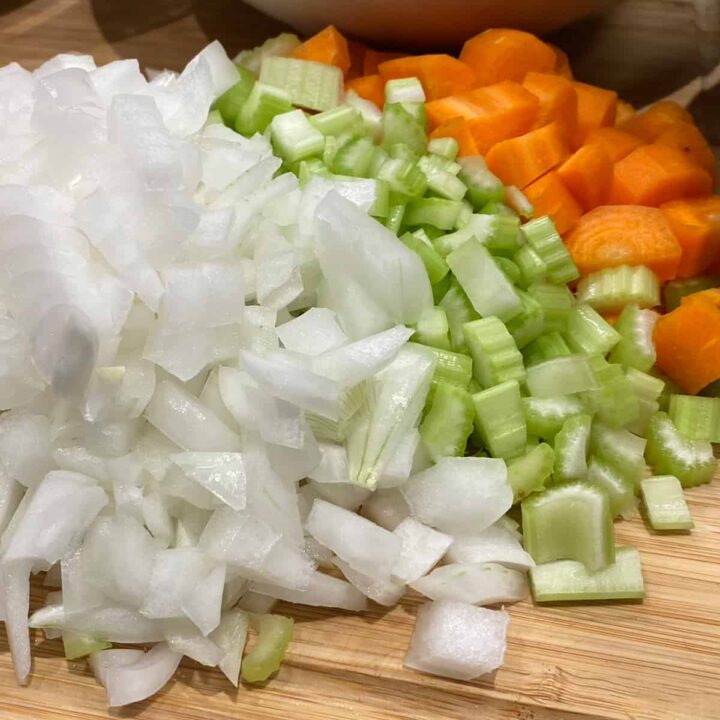 Cut Onion carrots and celery and set aside