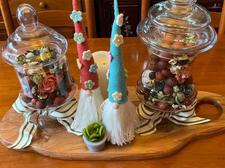 Spring Apothecary jars Decor with gnomes as a centerpiece