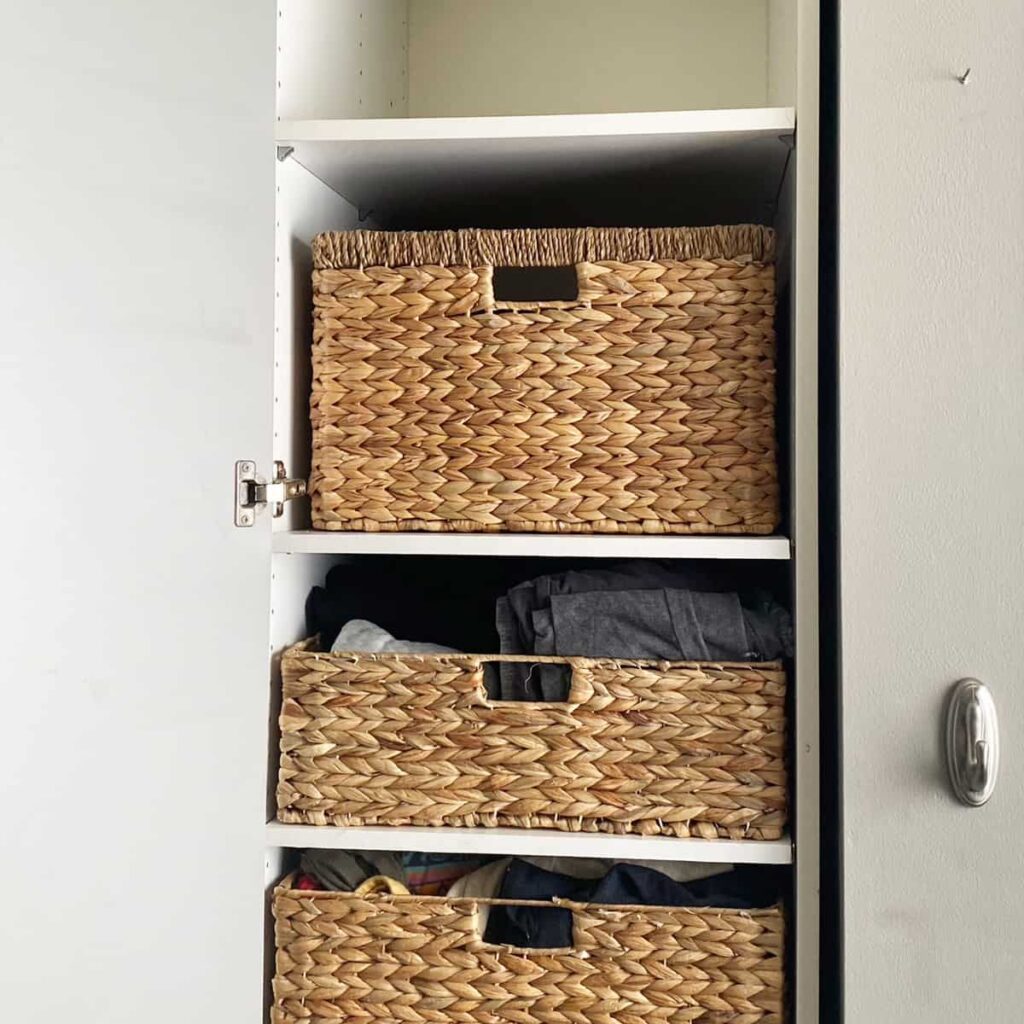 Add new shelves and bins to the cabinet