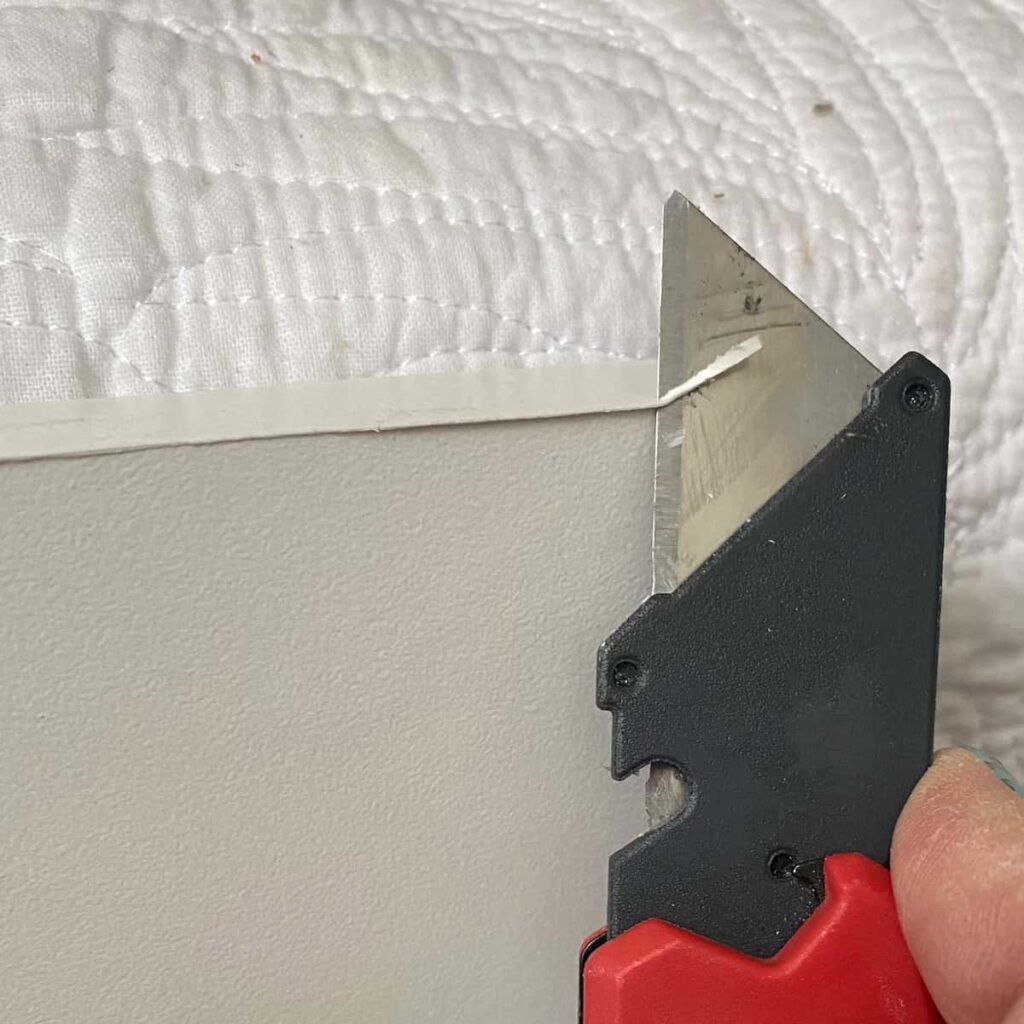 cut off the excess melamine veneer