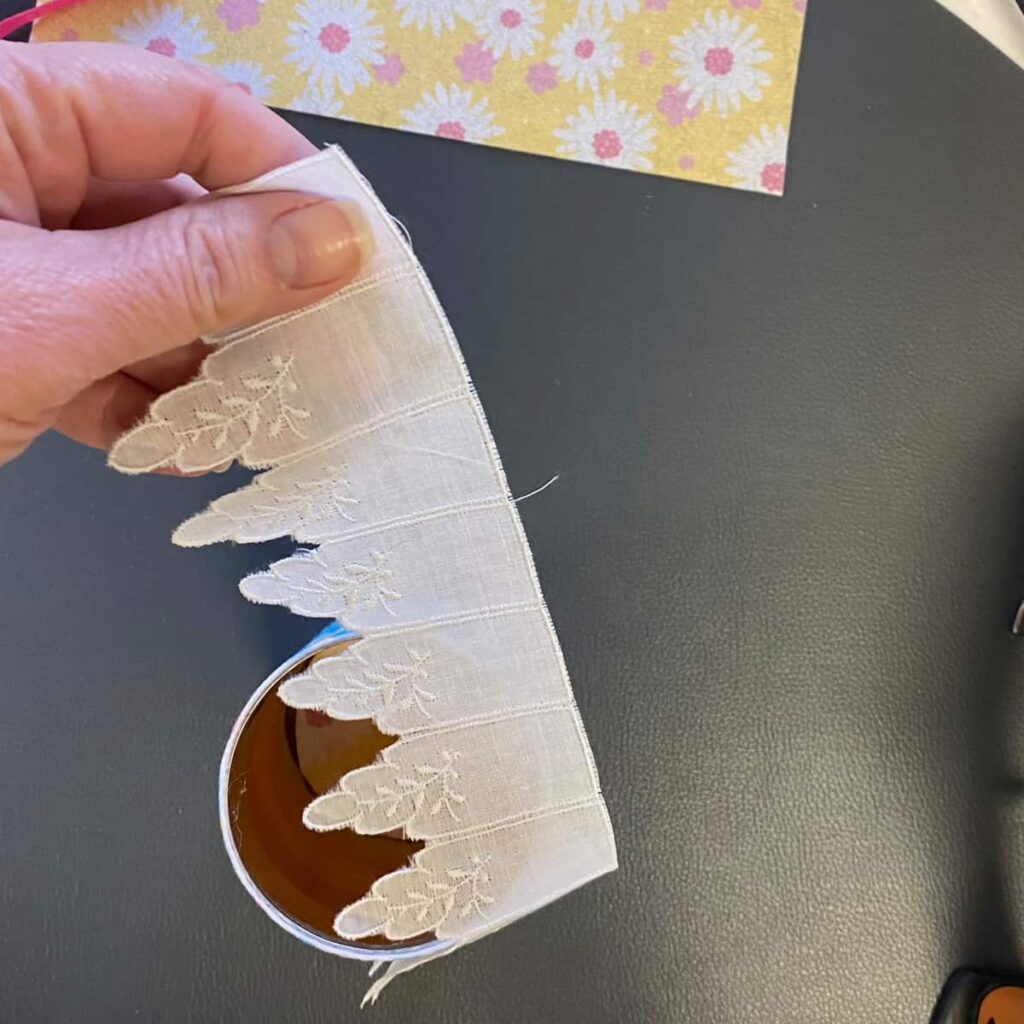 add the ribbon around the top edge and fold the edge in